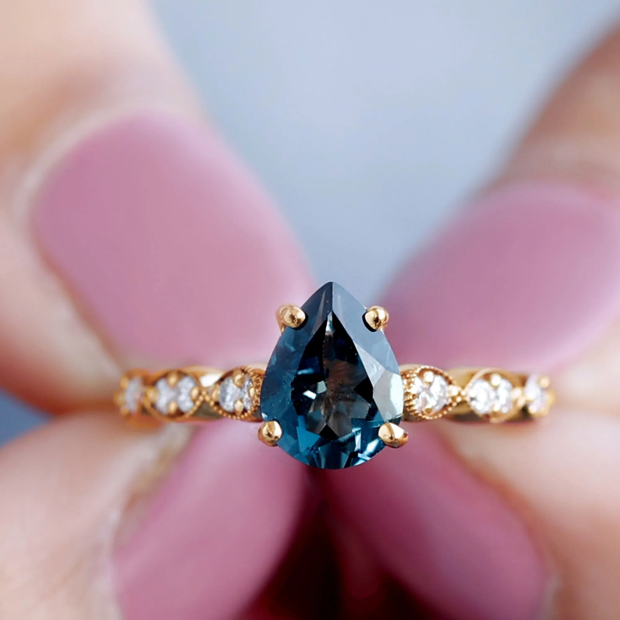 Pear Cut London Blue Topaz Solitaire Ring with Diamond Side Stones