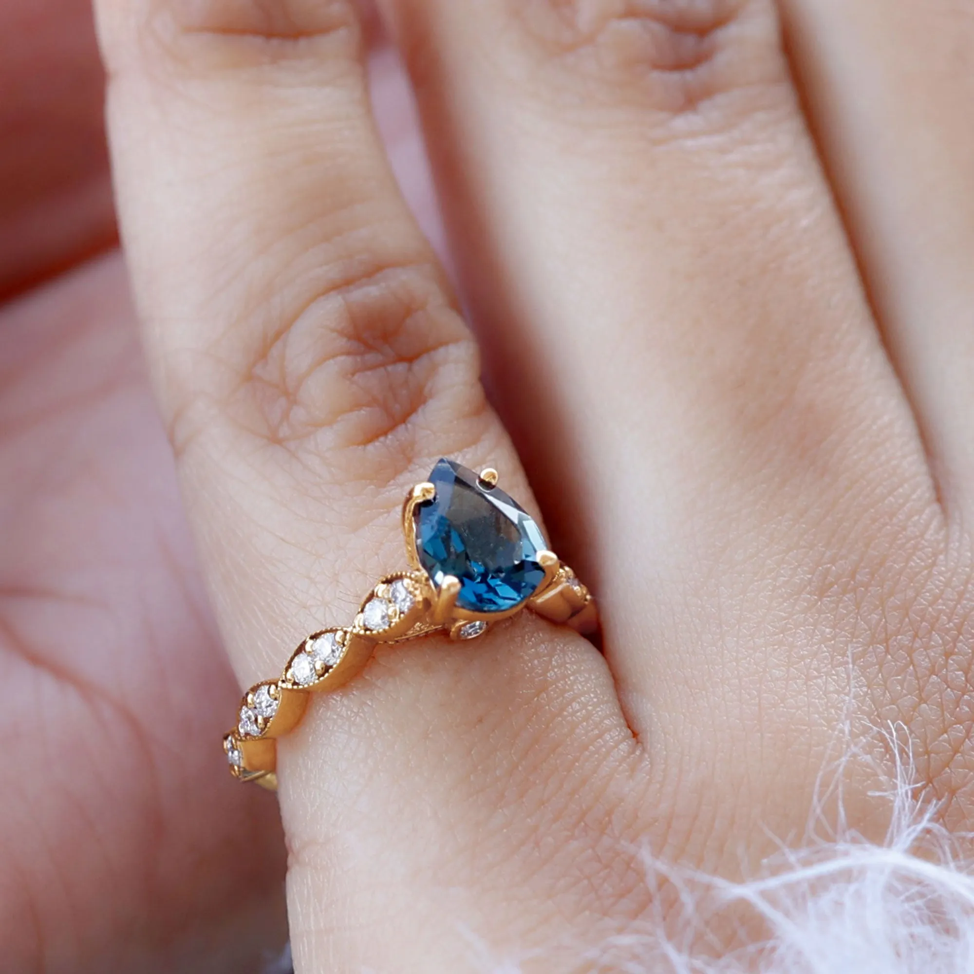 Pear Cut London Blue Topaz Solitaire Ring with Diamond Side Stones