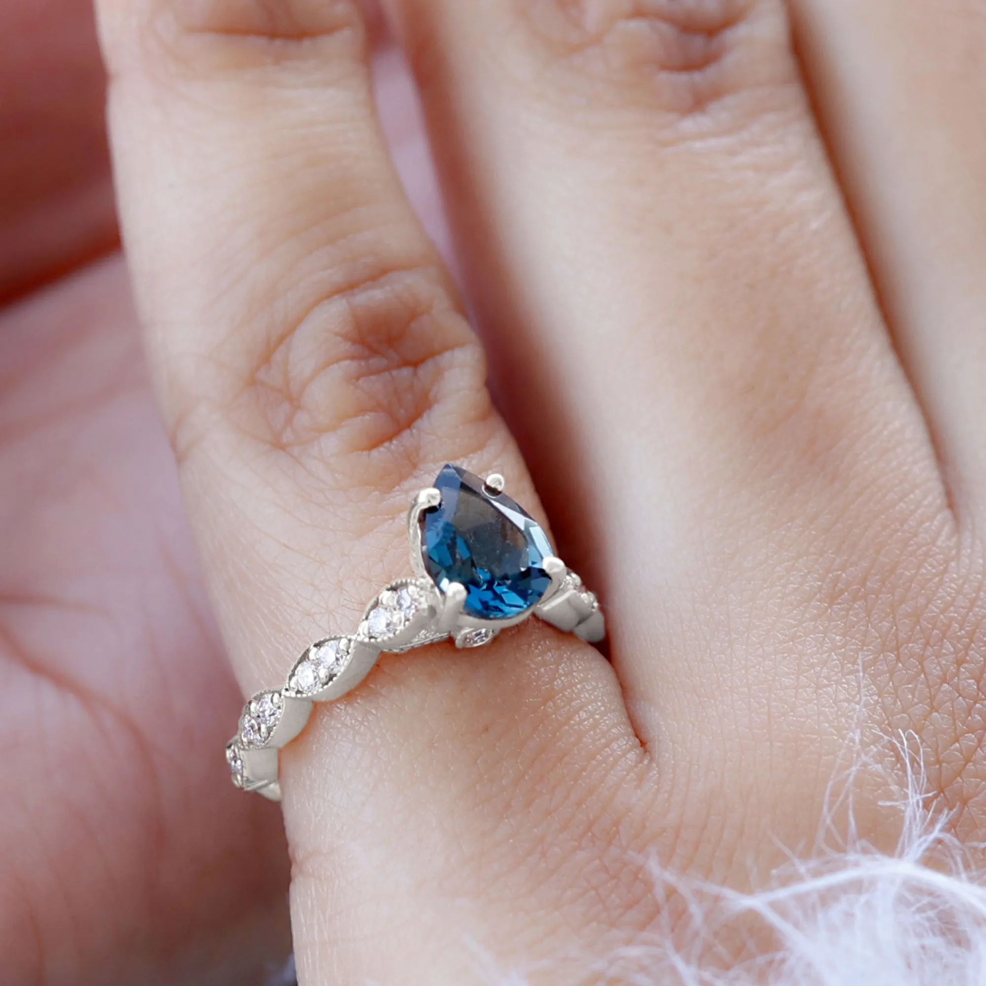Pear Cut London Blue Topaz Solitaire Ring with Diamond Side Stones