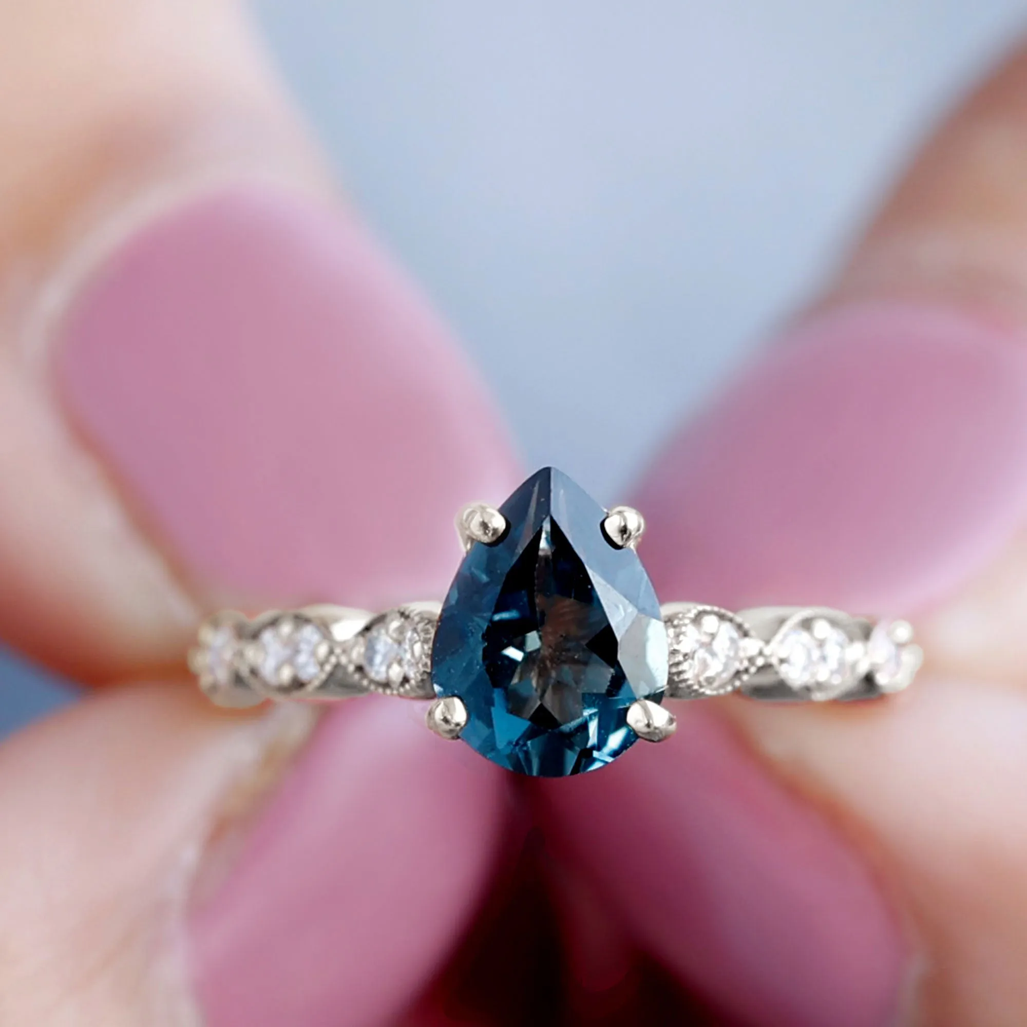 Pear Cut London Blue Topaz Solitaire Ring with Diamond Side Stones