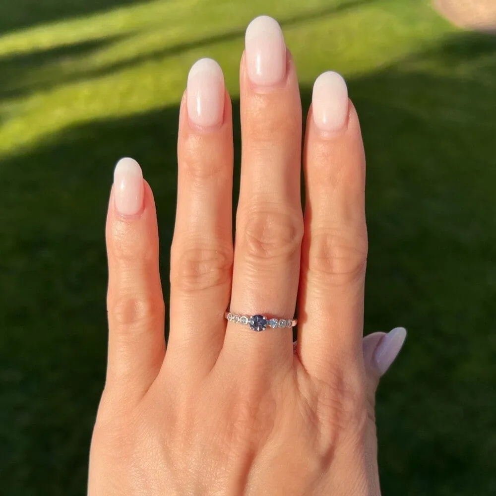 Platinum Color Change Garnet and Diamond Ring at Regard Jewelry in Austin, Texas