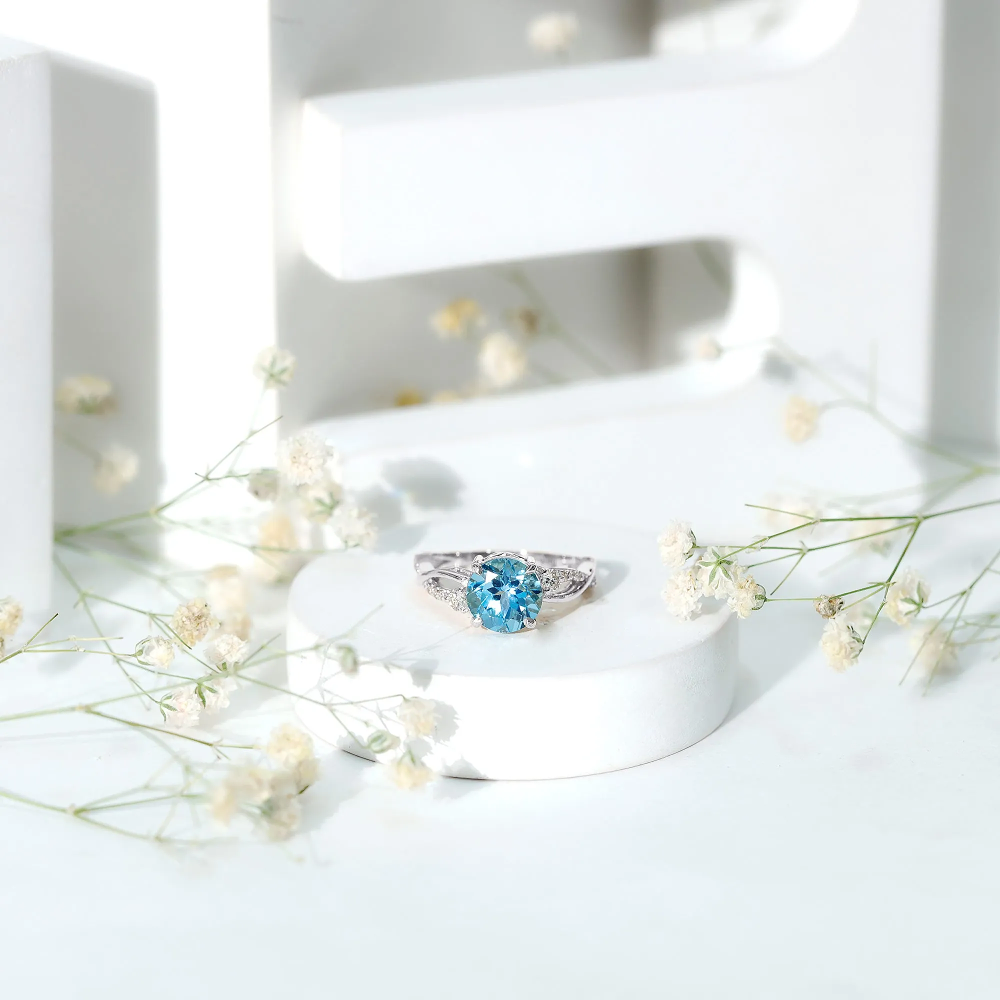 Swiss Blue Topaz and Diamond Engagement Ring with Crossover Shank