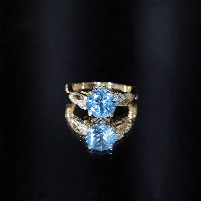 Swiss Blue Topaz and Diamond Engagement Ring with Crossover Shank
